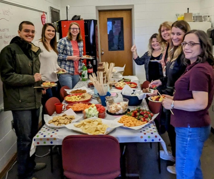 HHS faculty & staff enjoy a chocolate fountain which was the heart of this year's Valentine's Day buffet.