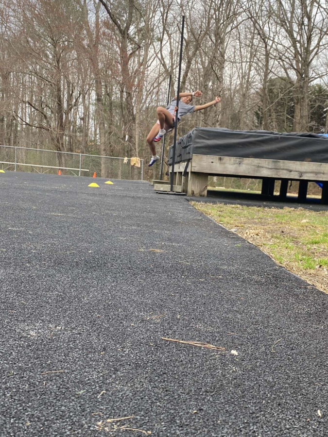 Kylah Eller works on her high jump skills during practice.